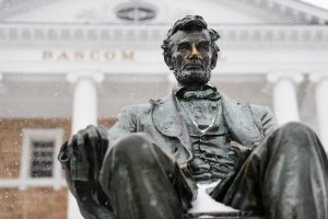 A light snow falls on the Abraham Lincoln statue in front of Bascom Hall at the University of Wisconsin-Madison during winter on Dec. 28, 2015. (Photo by Jeff Miller/UW-Madison)