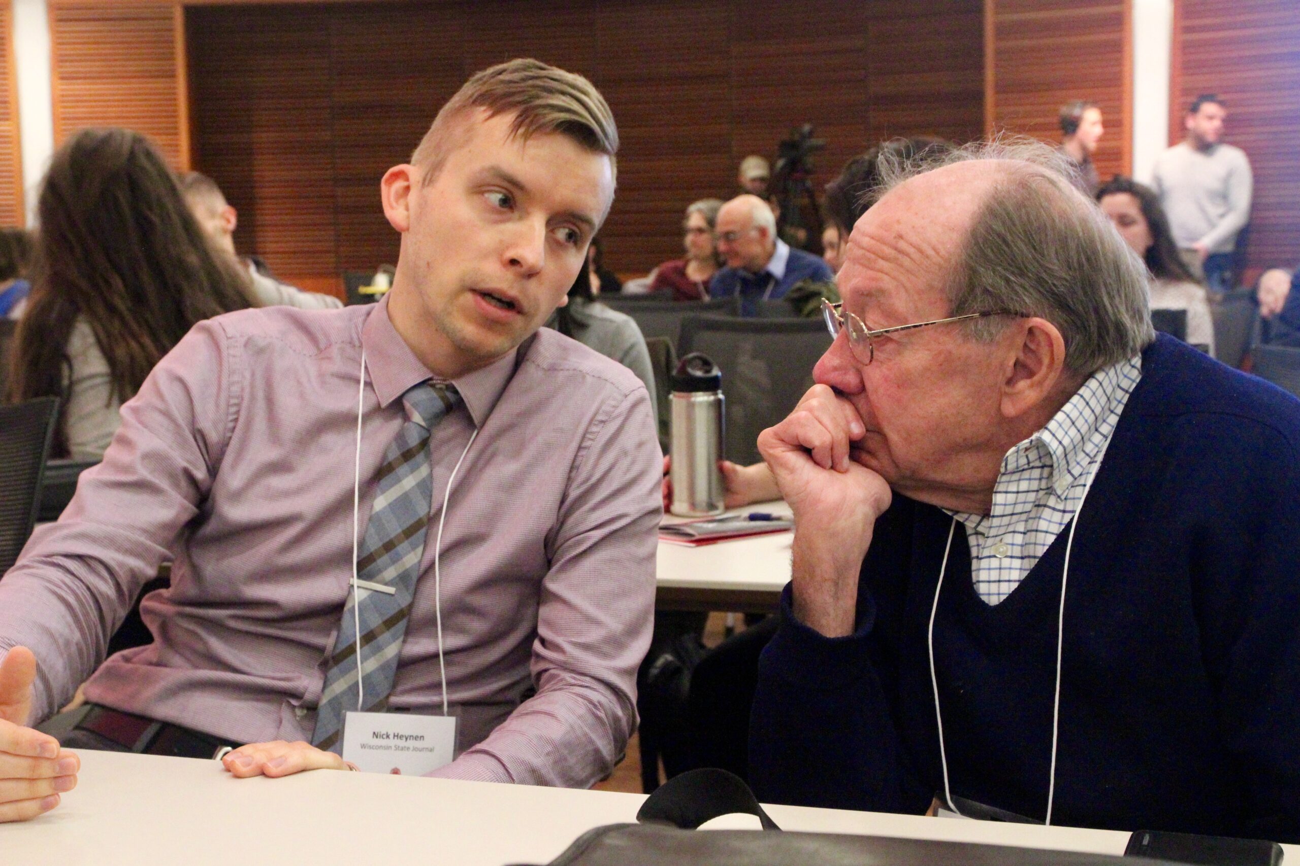Jim Burgess (right) speaks with Nick Heynen (left) at the conference, “What MeToo Means for Gender, Journalism and Power,” organized in 2018 by the Center for Journalism Ethics at UW–Madison.